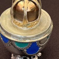 Exquisite Silver Egg with Gemstone Inlay - Image 3