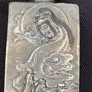 Vintage Silver Flask with Intricate Design