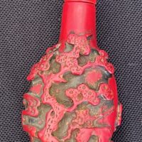 Exquisite Red Carved Snuff Bottle with Sage Design - Image 3